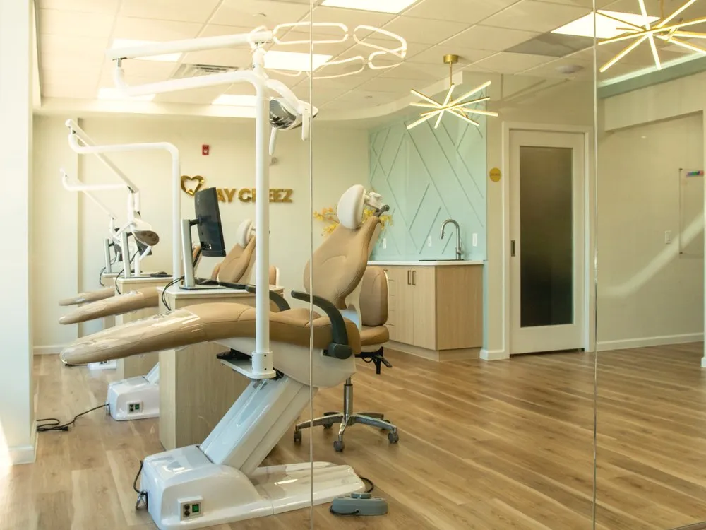 Bright orthodontic operatory under a starburst light fixture