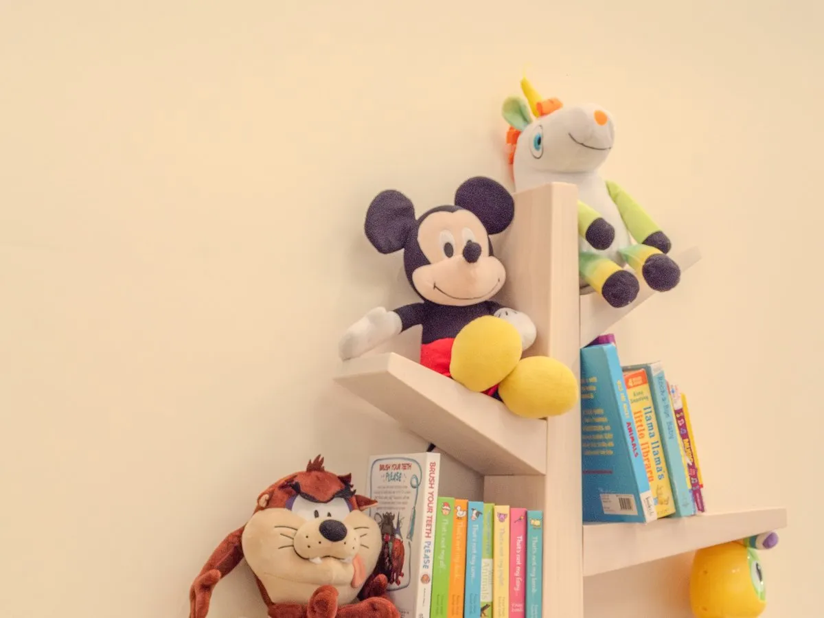 The Toy Nook — plush toys and picture books on a tree-shaped shelf